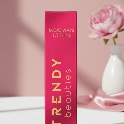 TRENDY beauties High-Shine Fuchsia Lipstick box with gold text and a pink flower in the background