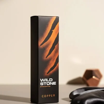 Wild Stone Copper Perfume bottle box, black and orange claw-mark design, intense men's fragrance.