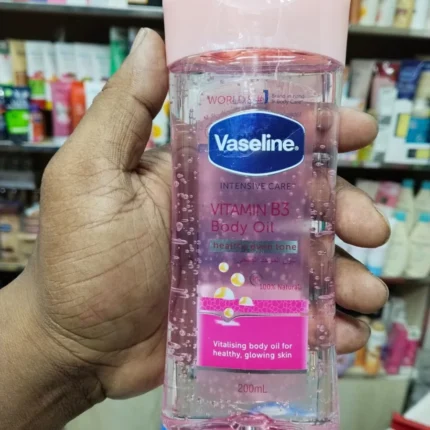 Vaseline Intensive Care Vitamin B3 Body Oil bottle in premium golden packaging – skincare moisturizing body oil from UAE
